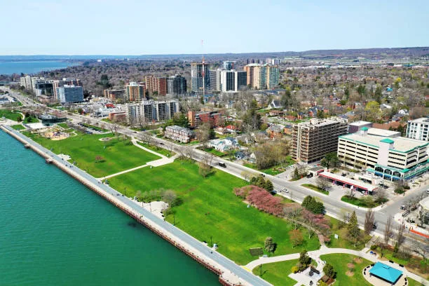 Burlington's waterfront on Lake Ontario with downtown condos in the distance, where Numinor provides remote bookkeeping for local businesses.